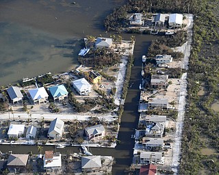 Damaged houses are shown in the aftermath of Hurricane Irma, Monday, Sept. 11, 2017, in the Florida Keys. (Matt McClain/The Washington Post via AP, Pool)