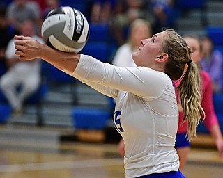 HUBBARD, OHIO - SEPTEMBER 12, 2017: Hubbard's Kristin Fahndrich hits the ball during their match, Tuesday night at Hubbard High School. DAVID DERMER | THE VINDICATOR