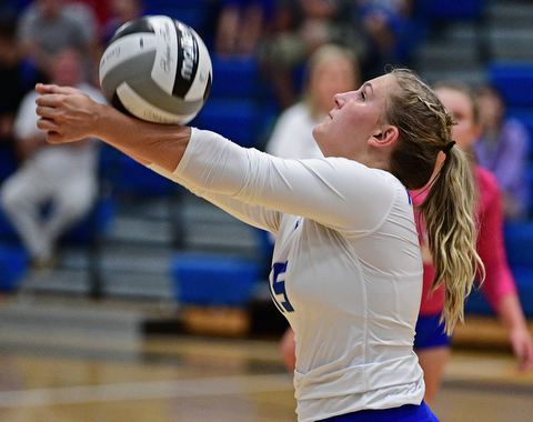 HUBBARD, OHIO - SEPTEMBER 12, 2017: Hubbard's Kristin Fahndrich hits the ball during their match, Tuesday night at Hubbard High School. DAVID DERMER | THE VINDICATOR