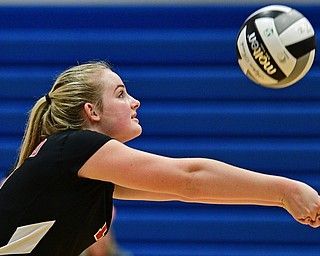 HUBBARD, OHIO - SEPTEMBER 12, 2017: Canfield's Alyssa Householder hits the ball during their match, Tuesday night at Hubbard High School. DAVID DERMER | THE VINDICATOR