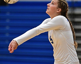 HUBBARD, OHIO - SEPTEMBER 12, 2017: Hubbard's Silvia Genoni bumps the ball during their match, Tuesday night at Hubbard High School. DAVID DERMER | THE VINDICATOR