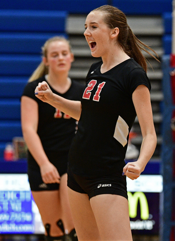 HUBBARD, OHIO - SEPTEMBER 12, 2017: Canfield's Alexis Metille celebrates after a Canfield point during their match, Tuesday night at Hubbard High School. DAVID DERMER | THE VINDICATOR