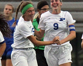 William D. Lewis the Vindicator Polands Maggie Sebest(9) gets congrats from Alexis Demain(25) after scoring during 9-13-17 action in Poland/