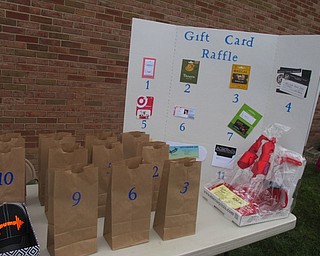 Neighbors | Zack Shively  .The Poland Dobbins PTO had a raffle during the tailgate event on Sept. 1 at the school. Prizes included gift cards, a hat and a gift basket.