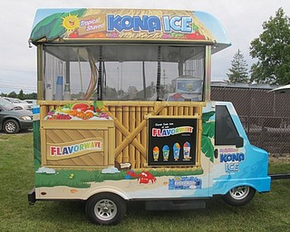 Neighbors | Zack Shively  .The Kona Ice Truck set up in the yard of Dobbins Elementary and offered students shaved ice during the tailgate event on Sep. 1