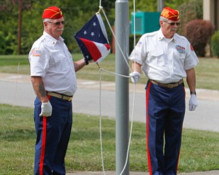     ROBERT K. YOSAY  | THE VINDICATOR..Post 472 and Neil Kennedy Recovery Centers joined forces to paint the flag pole and raise a new flag - with the date 9/11 - as a background Jeff Gulling and Gene Apgar with  Tri-State Marine Corps League #494  officially raised the new flag ...-30-
