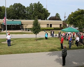     ROBERT K. YOSAY  | THE VINDICATOR..Post 472 and Neil Kennedy Recovery Centers joined forces to paint the flag pole and raise a new flag - with the date 9/11 - as a background Jeff Gulling and Gene Apgar with  Tri-State Marine Corps League #494  officially raised the new flag ...-30-