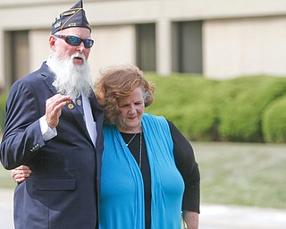     ROBERT K. YOSAY  | THE VINDICATOR..Post 472 and Neil Kennedy Recovery Centers joined forces to paint the flag pole and raise a new flag - with the date 9/11 - as a background Jeff Gulling and Gene Apgar with  Tri-State Marine Corps League #494  officially raised the new flag ..Will Midkiff - Post 472 and  Carolyn Givens with Neil Recovery.-30-