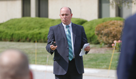     ROBERT K. YOSAY  | THE VINDICATOR..Post 472 and Neil Kennedy Recovery Centers joined forces to paint the flag pole and raise a new flag - with the date 9/11 - as a background Jeff Gulling and Gene Apgar with  Tri-State Marine Corps League #494  officially raised the new flag ..Mayor John  McNally .-30-