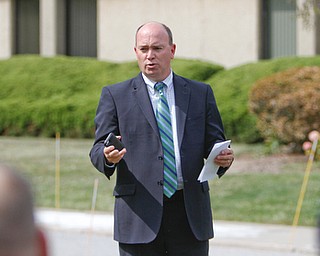     ROBERT K. YOSAY  | THE VINDICATOR..Post 472 and Neil Kennedy Recovery Centers joined forces to paint the flag pole and raise a new flag - with the date 9/11 - as a background Jeff Gulling and Gene Apgar with  Tri-State Marine Corps League #494  officially raised the new flag ..Mayor John  McNally .-30-