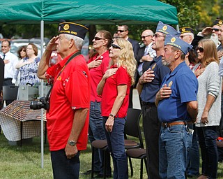    ROBERT K. YOSAY  | THE VINDICATOR..Post 472 and Neil Kennedy Recovery Centers joined forces to paint the flag pole and raise a new flag - with the date 9/11 - as a background Jeff Gulling and Gene Apgar with  Tri-State Marine Corps League #494  officially raised the new flag ...-30-
