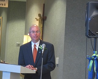 Neighbors | Zack Shively  .Paul Homick, Jr., president of the Mercy Health Foundation Mahoning Valley and interim vice president of mission integration for Mercy Health, spoke at ribbon cutting ceremony for St. Elizabeth Boardman Hospital's new pharmacy. He gave high praise to Sr. Margaret Mary Siegfried H.M., the namesake of the pharmacy.