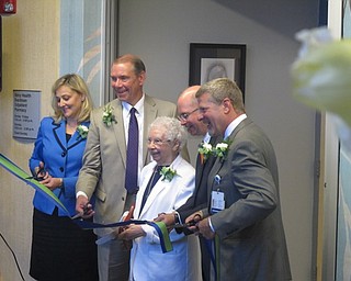 Neighbors | Zack Shively  .St. Elizabeth Boardman Hospital cut the ribbon at a ceremony celebrating the opening of their new ambulatory pharmacy at the hospital. Pictured, from left, are Genie Aubel, Genie Aubel, president of St. Elizabeth Boardman Hospital, Don Kline, president and CEO of Mercy Health - Youngstown, Sister Margaret Mary Siegfried, H.M., Paul Homick, president of the Mercy Health Foundation Mahoning Valley and interim vice president of mission integration for Mercy Health - Youngstown and Barry Shick, chief pharmacy officer for Mercy Health - Youngstown.