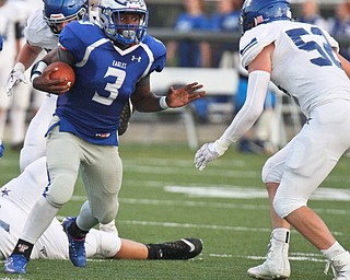 William D. Lewis The Vindicator  Hubbard's Tyreq Moorer(3) eludes Lakeview's Alec Bartholomew(52) during 1rts half action at Hubbard 9-15-17.