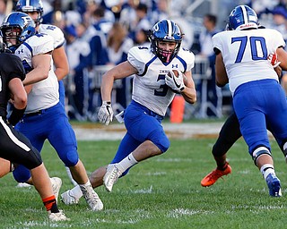 MICHAEL G TAYLOR | THE VINDICATOR- 09-15-17 FOOTBALL Poland Bulldogs vs Howland Tigers at Howland High School, Warren, OH.1st qtr., Poland's #3 Jonah Spencer breaks through the line for a long gain.