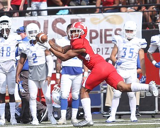 Youngstown State University wide receiver Stefan Derrick II (13) reaches out to catch a pass from Youngstown State University quarterback Nathan Mays (7) in the second quarter as Youngstown State takes on Central Connecticut State, Saturday, Sept. 16, 2017, at Stambaugh Stadium in Youngstown. Youngstown State won 59-9...(Nikos Frazier | The Vindicator)..