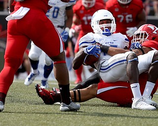 Youngstown State University line backer Curtis Parks (41) takes down Central Connecticut State University Blue Devils wide receiver Courtney Rush (17) in the second quarter as Youngstown State takes on Central Connecticut State, Saturday, Sept. 16, 2017, at Stambaugh Stadium in Youngstown. Youngstown State won 59-9...(Nikos Frazier | The Vindicator)..