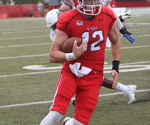 Youngstown State University wide receiver Ricky Davis (12) runs out of bounds in the third quarter as Youngstown State takes on Central Connecticut State, Saturday, Sept. 16, 2017, at Stambaugh Stadium in Youngstown. Youngstown State won 59-9...(Nikos Frazier | The Vindicator)..