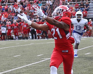 Youngstown State University defensive end Jamal Smith (21) stretches out for the pass in the third quarter as Youngstown State takes on Central Connecticut State, Saturday, Sept. 16, 2017, at Stambaugh Stadium in Youngstown. Youngstown State won 59-9...(Nikos Frazier | The Vindicator)..