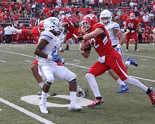 Youngstown State University wide receiver Ricky Davis (12) pushes past Central Connecticut State University Blue Devils defensive back Tajik Bagley (23) in the fourth quarter as Youngstown State takes on Central Connecticut State, Saturday, Sept. 16, 2017, at Stambaugh Stadium in Youngstown. Youngstown State won 59-9...(Nikos Frazier | The Vindicator)..