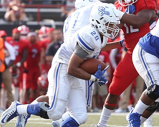 Youngstown State University defensive end Ma'lik Richmond (12) makes a move towards Central Connecticut State University Blue Devils running back Drew Jean-Guillaume (20) in the fourth quarter as Youngstown State takes on Central Connecticut State, Saturday, Sept. 16, 2017, at Stambaugh Stadium in Youngstown. Youngstown State won 59-9...(Nikos Frazier | The Vindicator)..
