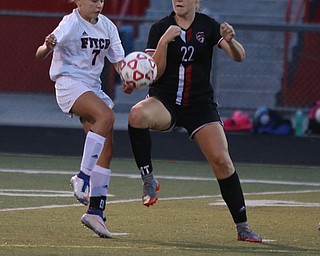 Austintown Fitch's Katlyn Klasic (7) fights for a loose ball with Canfield's Chloe Kalina (22) during the first half of Monday night's matchup at Fitch High School.   Dustin Livesay  |  The Vindicator  9/18/17  Fitch.