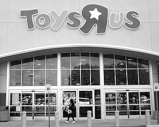 A customer walks into a Toys R Us store in Dallas, Tuesday, Sept. 19, 2017. Toys R Us has filed for Chapter 11 bankruptcy protection while continuing with normal business operations. (AP Photo/LM Otero)