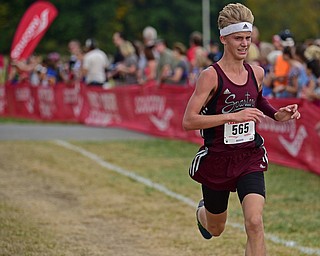 Boardman's Mitchel Dunham sprints to the finish line during the 2017 Suburban League Championship, Tuesday afternoon at the Canfield Fair Grounds. He would finish 6th. DAVID DERMER | THE VINDICATOR