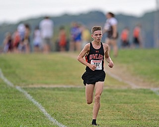 Howland's Vincent Mauri sprints alone ahead of the pack on the back stretch during the 2017 Suburban League Championship, Tuesday afternoon at the Canfield Fair Grounds. DAVID DERMER | THE VINDICATOR