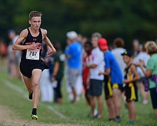 Howland's Vincent Mauri sprints to the finish line to win the 2017 Suburban League Championship, Tuesday afternoon at the Canfield Fair Grounds. DAVID DERMER | THE VINDICATOR