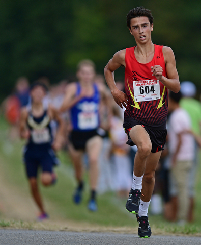 Canfield's Giovanni Copploe sprints to the finish line ahead of Maplewood's Ethan Sparks and McDonald's Ethan Domitrovich during the 2017 Suburban League Championship, Tuesday afternoon at the Canfield Fair Grounds. Copploe would finish second. DAVID DERMER | THE VINDICATOR