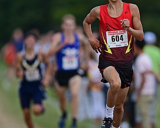 Canfield's Giovanni Copploe sprints to the finish line ahead of Maplewood's Ethan Sparks and McDonald's Ethan Domitrovich during the 2017 Suburban League Championship, Tuesday afternoon at the Canfield Fair Grounds. Copploe would finish second. DAVID DERMER | THE VINDICATOR
