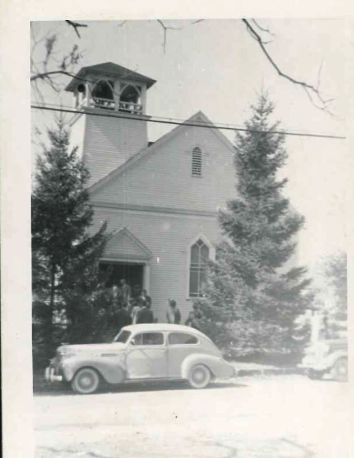 This is an early photograph of Zion Lutheran Church at the southwest corner of Tippecanoe and Canfield roads. The bell in this building rang for the first time in 1915, but it hasn’t rung since 1957 when the church relocated. The historic 487 pound bell was removed from this belfry and is now at the church’s current location where it will ring again Sunday.