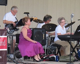 Neighbors | Zack Shively .Members of the Glass City Swing Band jammed out a popular swing tune at Boardman Park's Music in the Park on Aug. 10. Pictured from left (front) singer Caryn Dettling pianist Cherri Hull; (back) bassist Gene Hudak and drummer Danny Rosatti.