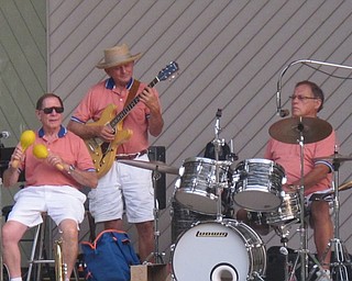 Neighbors | Zack Shively.The Jim Frank Combo jammed out a song with some Latin flair on Aug. 16 at Boardman Park's Concert in the Park. Pictured, from left, are Joe Commarata, Paul Jacobson and Bill Gonda.