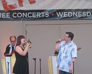 Neighbors | Zack Shively  .Singers Natalie Sprouse and James McClellan joined each other for "Love Me Tender" at Live! At the Morley concert at the Judge Morley Pavilion on Aug. 16. Easy Street performed a number of Elvis Presley songs in commemoration with the 40th anniversary of his passing.