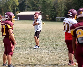 South Range head coach Dan Yeagley watches his defensive line during a weekday practice, Tuesday, Sept. 19, 2017, at South Range High School in Canfield. ..(Nikos Frazier | The Vindicator)