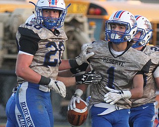 William D Lewis The Vindicator  WR's Ryan Demsky(1) gets congrats from Brandon Jarvis(20) after scoring during 1rst qtr 9-22-17 at home.
