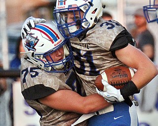 William D Lewis The Vindicator  WR's Adam Gtrell(31) celebrates with Dallas Smith(75) after scoring during 1rst qtr action 9-22-17 against Ridge.