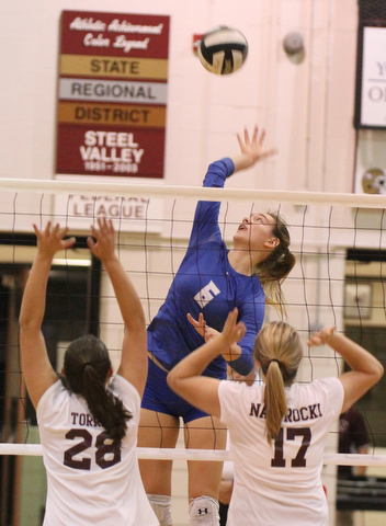 William D. Lewis The Vindicator Hubbard's Adria Powell(6) shoots past Boardman's Maria Torres(28) and Haannah Nawrocki(17) during 9-26-17 action at Boardman.