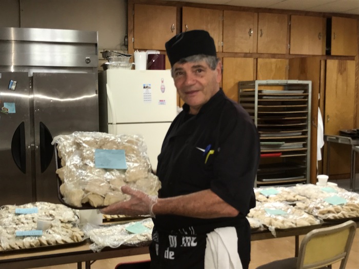 Chef Sam Restuccio shows off homemade pirogi at St. Stanislaus Church. Advance orders will be taken at 330-747-3024 from 8 a.m. to noon Thursday and Friday. Pickup will be Friday from 8:30 a.m. to 1 p.m. The cost is $6.50 per dozen and fillings include potato, kraut and cottage cheese. See video of Restuccio talking about the event on vindy.com.