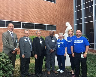Neighbors | Submitted .The St. Elizabeth Boardman Hospital 10th anniversary celebration kicked off at the hospital on Aug. 9 with a Spiritual Care Service to celebrate the hospital’s faith-based heritage and its mission. Pictured are, from left, Donald Kline, president and CEO of Mercy Health - Youngstown; Don Koenig, executive vice president and chief operating officer of Mercy Health - Youngstown; Father John Trimbur, chaplain, St. Elizabeth Boardman Hospital; Father Chidiebere Ogbuagu, director of mission and values for Mercy Health - Youngstown; Sister Darla Vogelsang, chaplain, Mercy Health - Youngstown; Genie Aubel, president of St. Elizabeth Boardman Hospital; and Dr. Heath Dorion, medical director of St. Elizabeth Boardman Hospital. In the background is a statue of St. Elizabeth, the hospital’s patron saint.