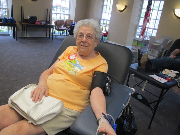 Neighbors | Zack Shively  .Lee Sheridan prepared to give at the Red Cross Blood Drive at the Poland library on Aug. 17.