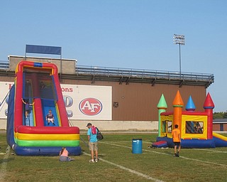 Neighbors | Zack Shively.Along with the running events, the organizers of the Cam Jaros Color Run offered a bounce castle, an inflatable slide, concessions, face painting, a photo booth, a DJ to play music and ice cream from Handel's. They also had a dance team, Austintown Fitch cheerleaders and YSU's Pete and Penny Peguin mascots at the event.