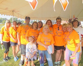Neighbors | Zack Shively  .The volunteers at the Cam Jaros Color Run made sure everything from registration to the photobooth to the actual running events ran smoothly. Pictured are, from left, (front) Maddy Miller, Deb Villers, Lynn Mickey; (middle) Matt Miller, Kim Miller, Kristen Jaros, Heather Gollan, Karen Franczkowski; (back) Shelli Collucci, Bethany Martinez, Angela Burgy, Kathy Kroloski and Phyllis Miller.