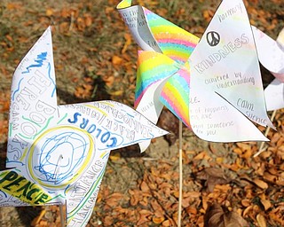 Neighbors | Abby Slanker.Canfield High School students created, decorated and ‘planted’ pinwheels with handwritten thoughts and feelings about peace for the international art and literacy project Pinwheels for Peace on Sept. 21.