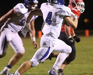Poland defensive back Mike Diaz(4) intercepts a pass and returns for a touchdown during the second quarter as Poland High School takes on Struthers High School, Friday, Sept. 29, 2017, at Stuthers High School in Struthers. Poland won 33-0...(Nikos Frazier | The Vindicator)..