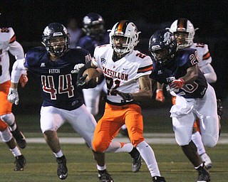 William D. Lewis The Vindicator Massillon's Anthony Ballard(21) is pursued by Fitch's Mike Ferree(41) and Machai Cheatham(20) during 1rst half action 9-29-17 at Fitch.