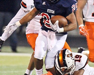 William D. Lewis The Vindicator Massillon's dean Clark(19) stopsFitch's Machai Cheatham(20) during 1rst half action 9-29-17 at Fitch.