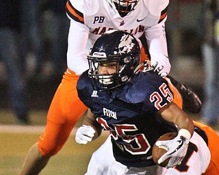 William D. Lewis The VindicatorFitch's Mahai Cheatham(20) is stopped by Massillon's Nakoa Keefer(4) and Dean Clark (19) during 1rst half action 9-29-17 at Fitch.